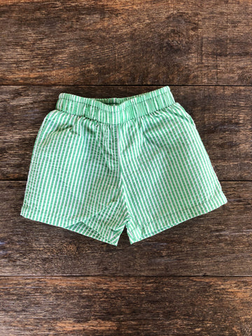 Bañador para niño de la coleccion ciclamen con rayitas verdes y blancas