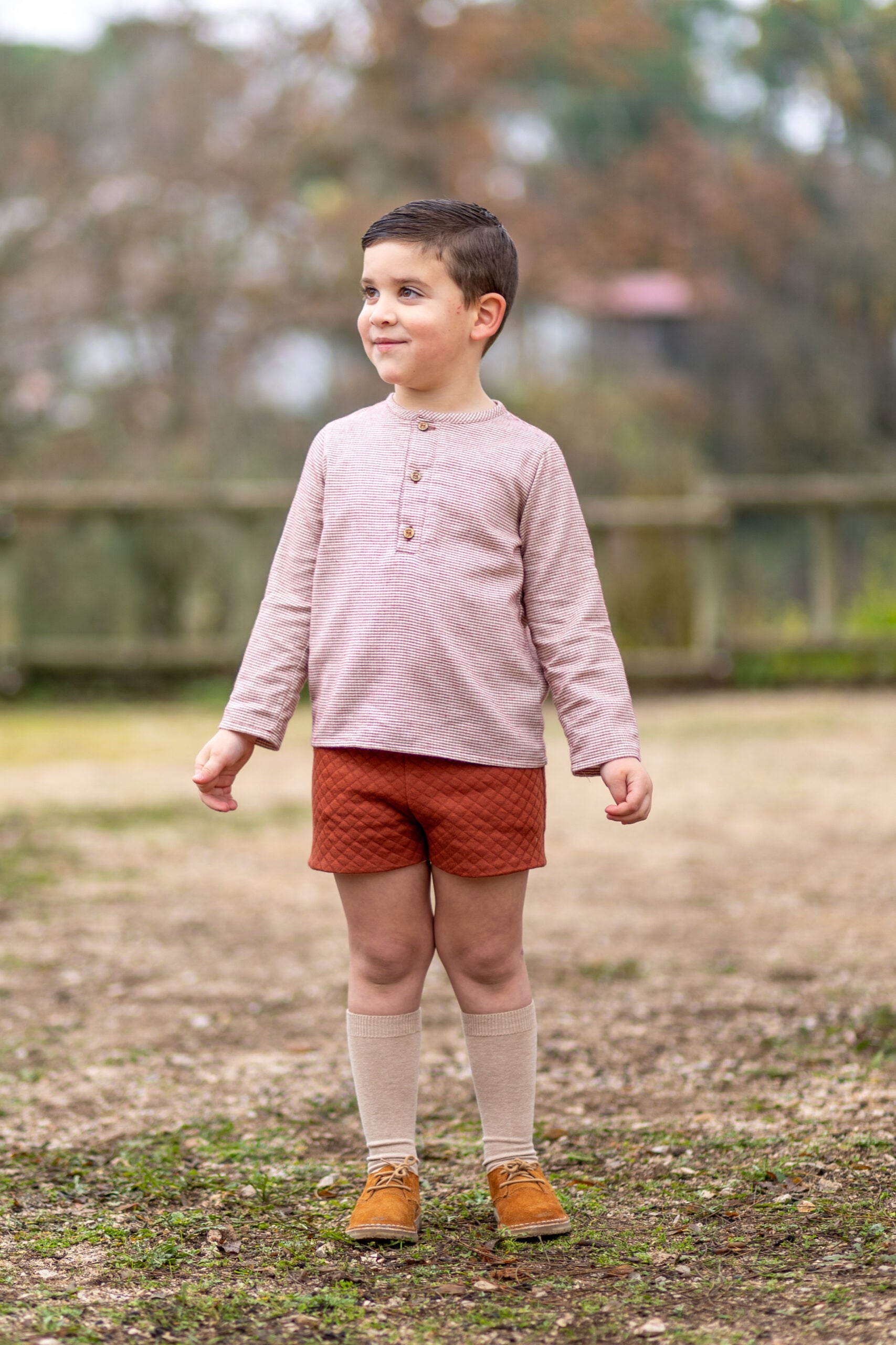 Camisa niño Telva de Boetiekids en cuadro vichy color caldera con abertura en delantero con tres botones. 37,35€