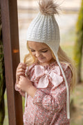 Pelele Daisy estampado con flores rosa, cuello de volante y manguita larga, una auténtica maravilla. 58,95€