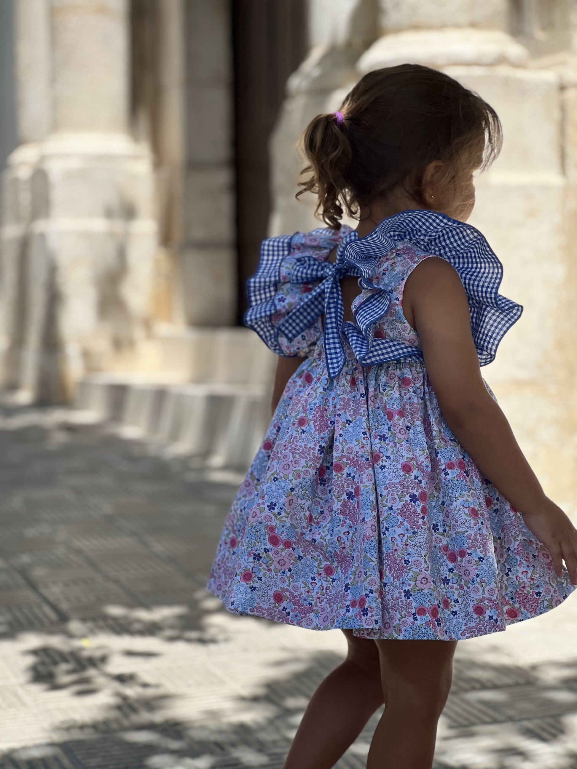 Espalda jesusito floral bebé niña con lazo vichy azul