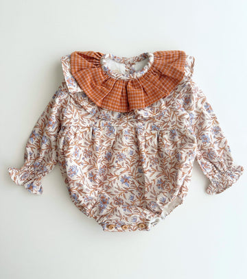 Pelele volantes flores raiz