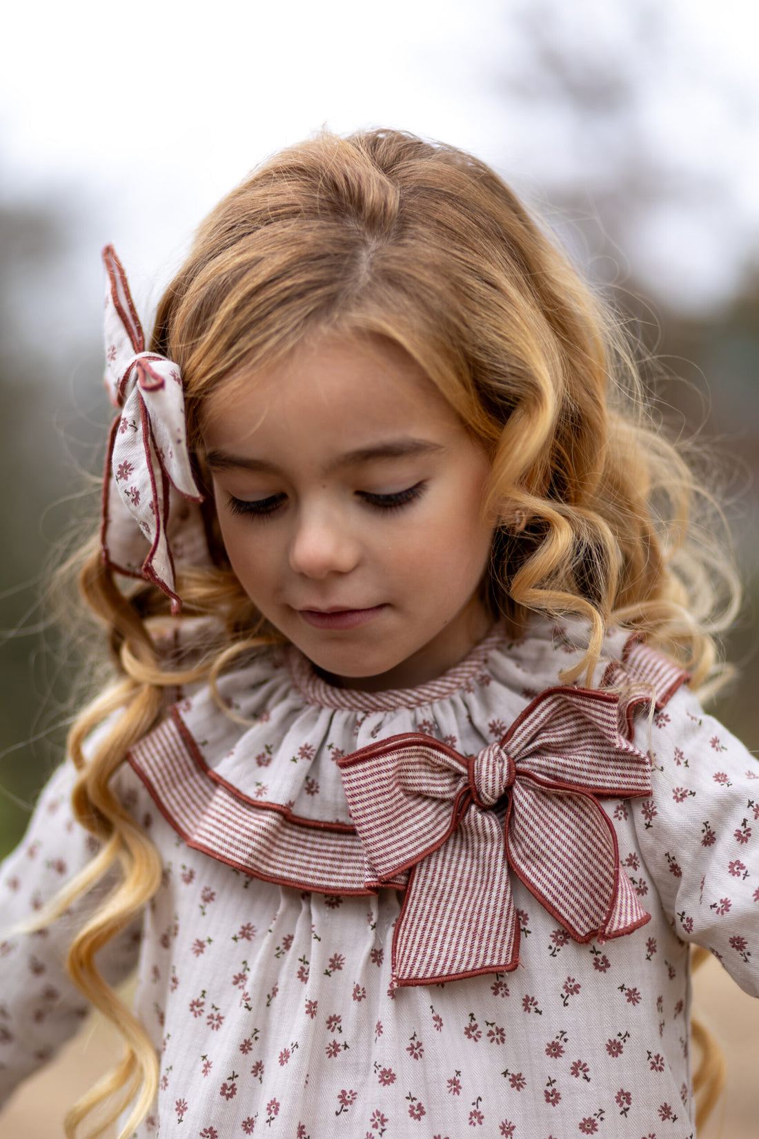 Jesusito con braguita Telva de Boetiekids, de florecitas con doble cuello combinabdo flores con vichy caldera a juego con la braguita