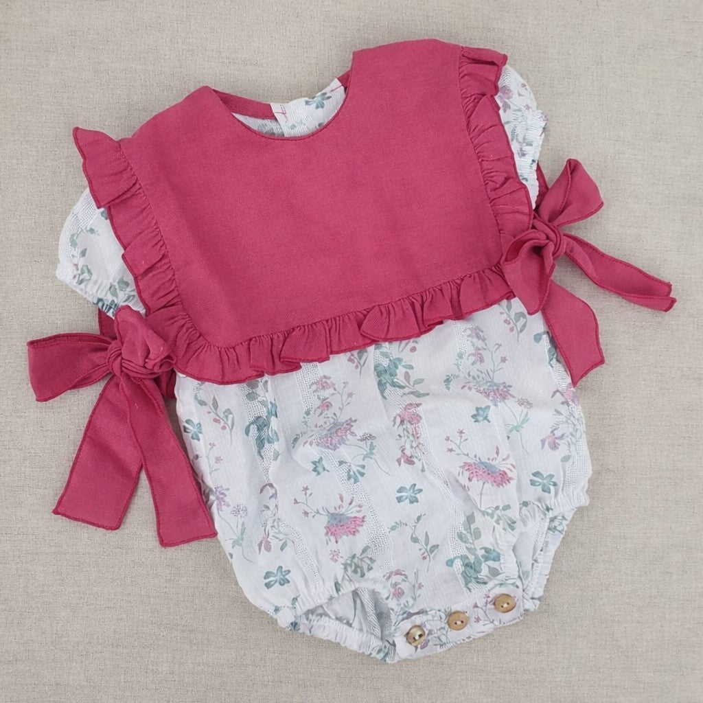 Pelele bebé rosa Jardín Rosé con lazos laterales