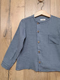 Camisa niño vichy Catalina abotonada en el lateral delantero. 38,95€