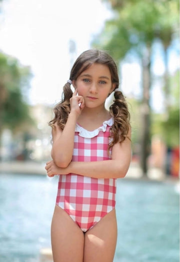 Bañador vichy para niña en color rojo y blanco ribeteado con volante blanco y espalda en pico remata con un lazo